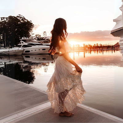 girl in skirt sunset