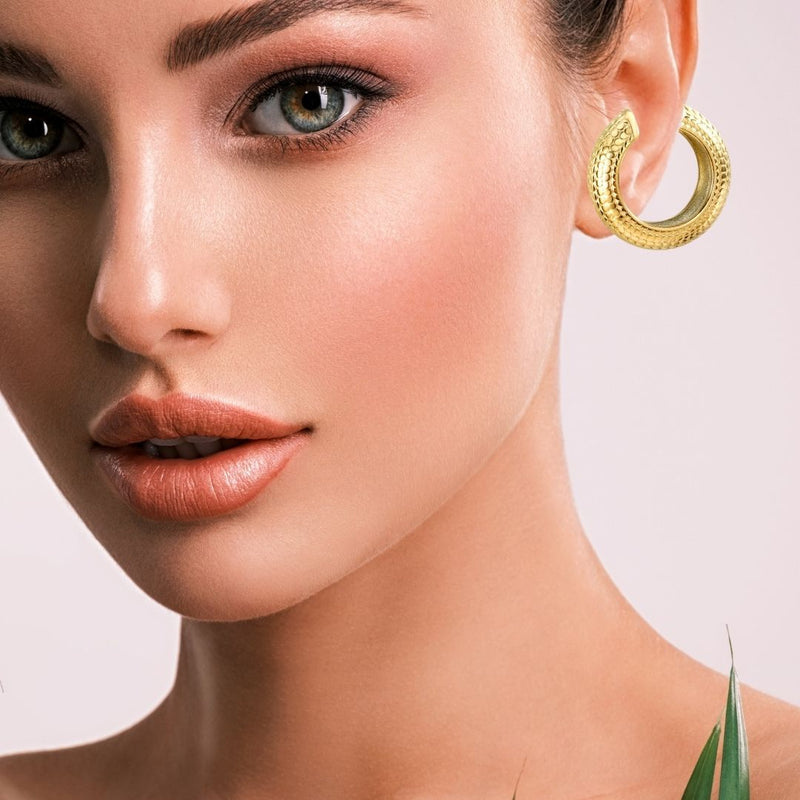 Gold oversize exaggerated earring clip