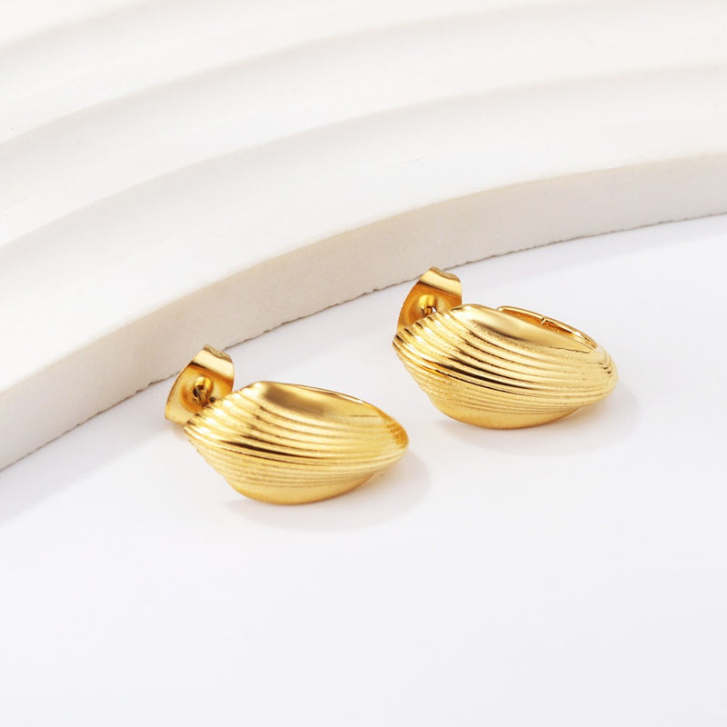 Gold stud earrings