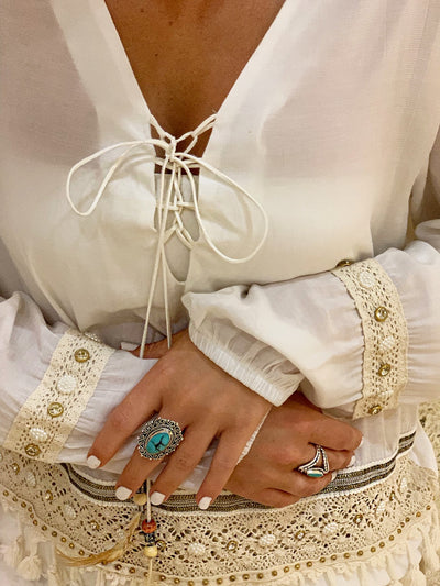 boho white tie up top with feathers sleeve cuff beading gold and white